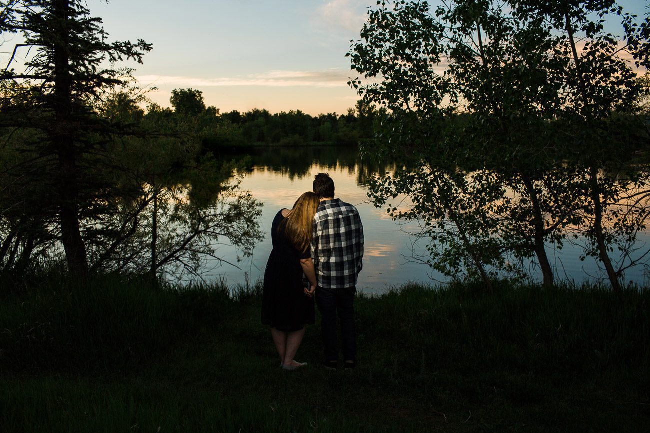 Engagement photos by a lake