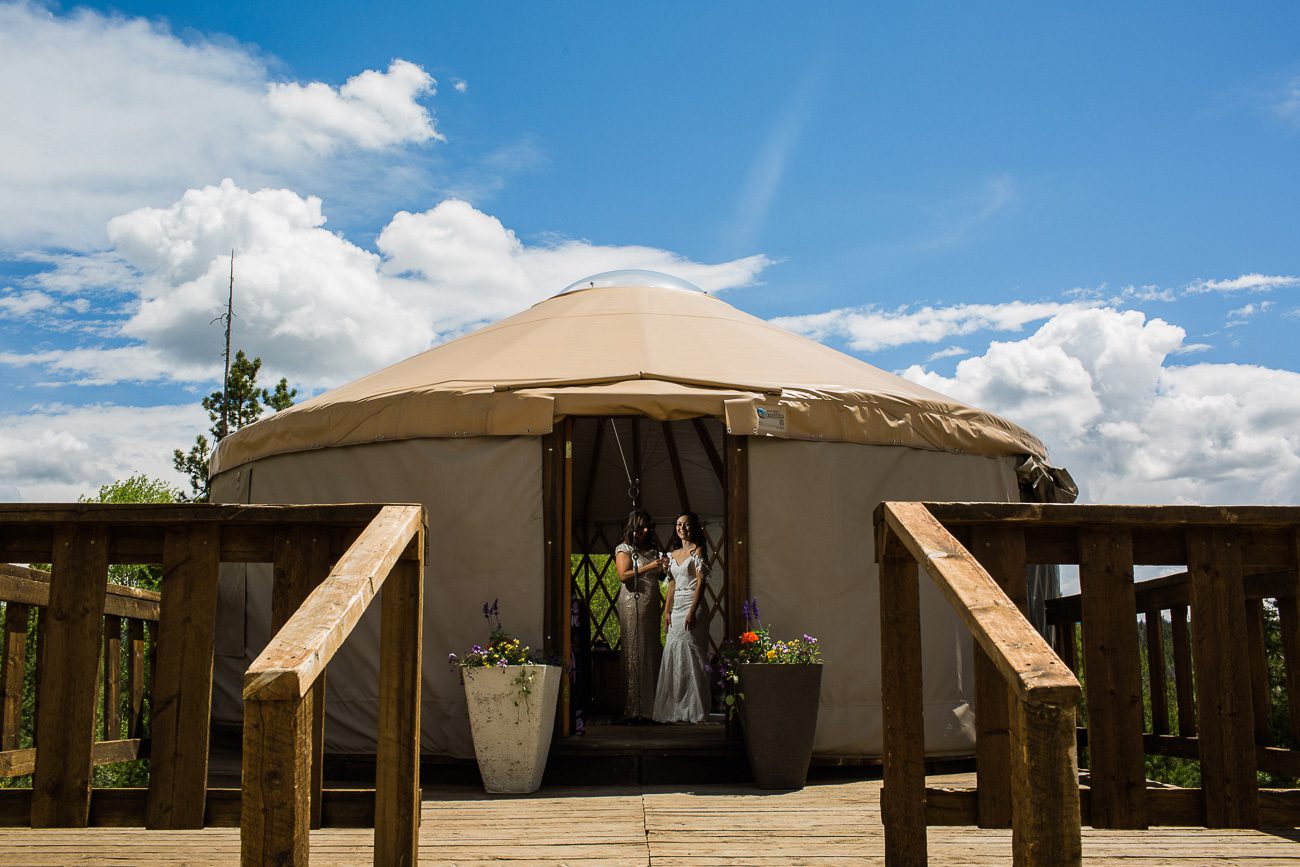 Bride getting ready in yurt at Granby Ranch