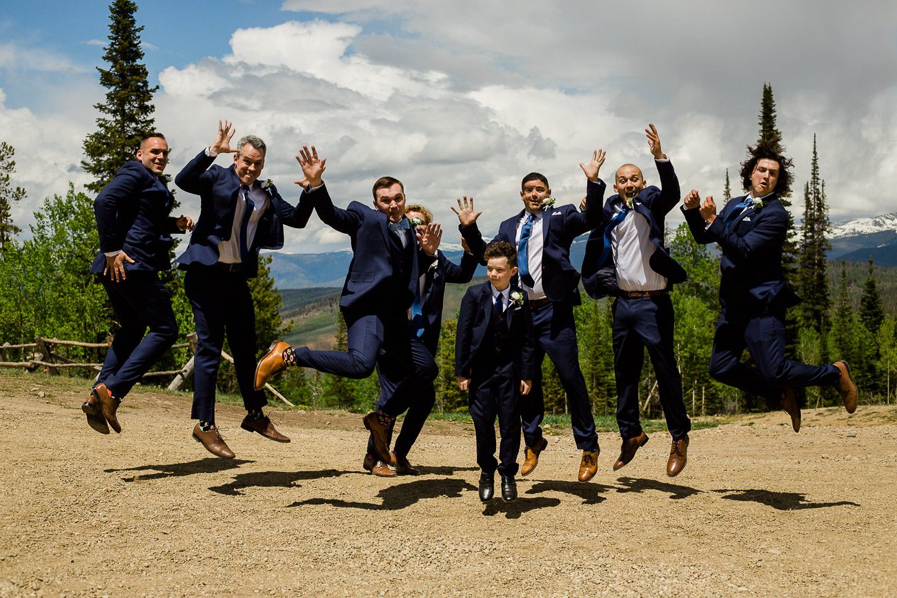 Fun groomsmen jumping photos