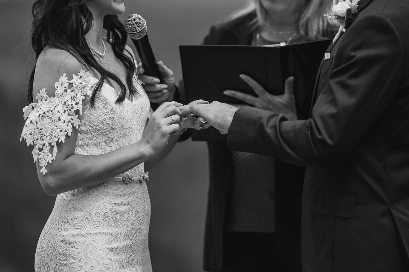 Exchanging rings Colorado wedding ceremony