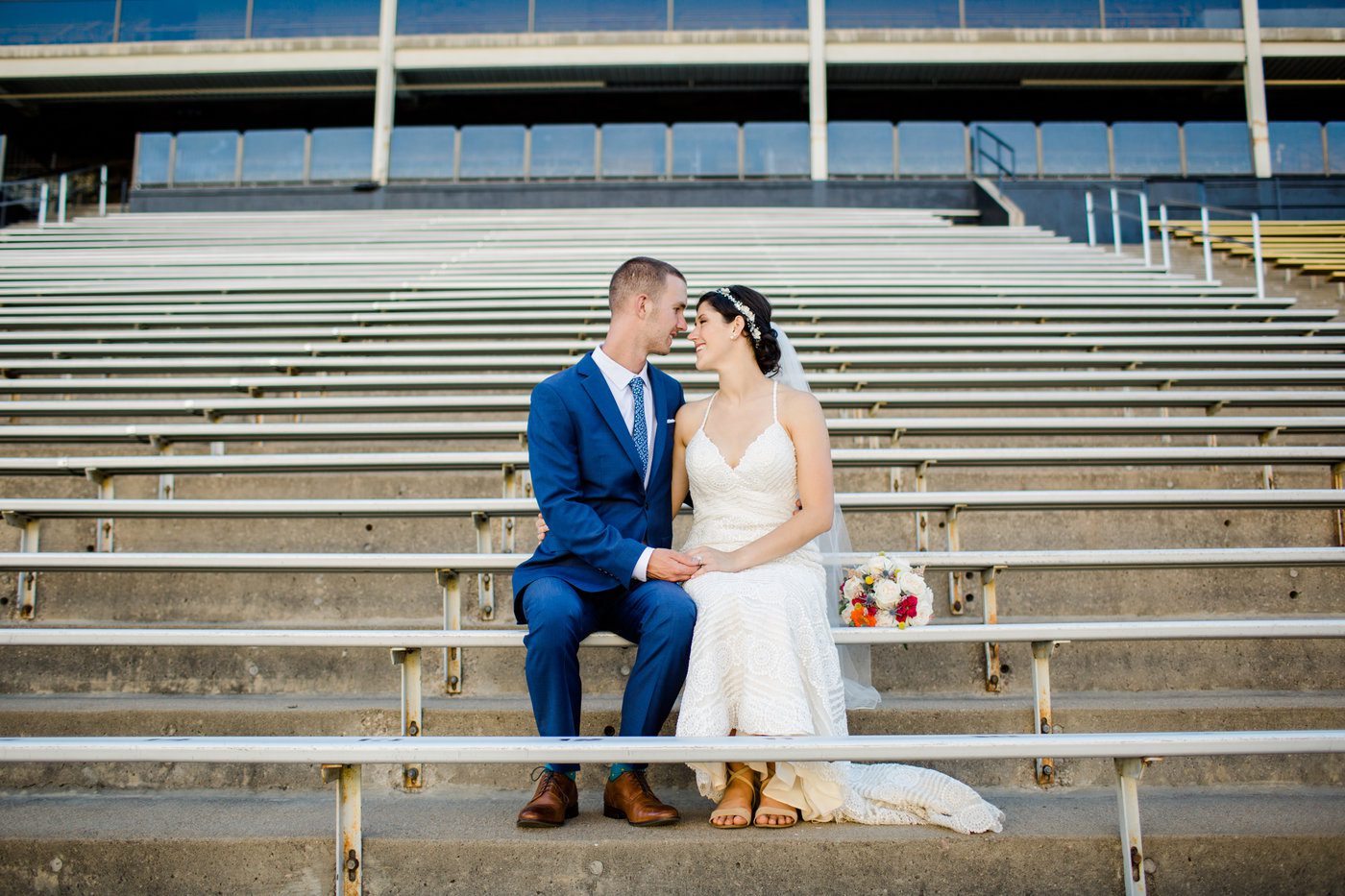 Football stadium wedding photo