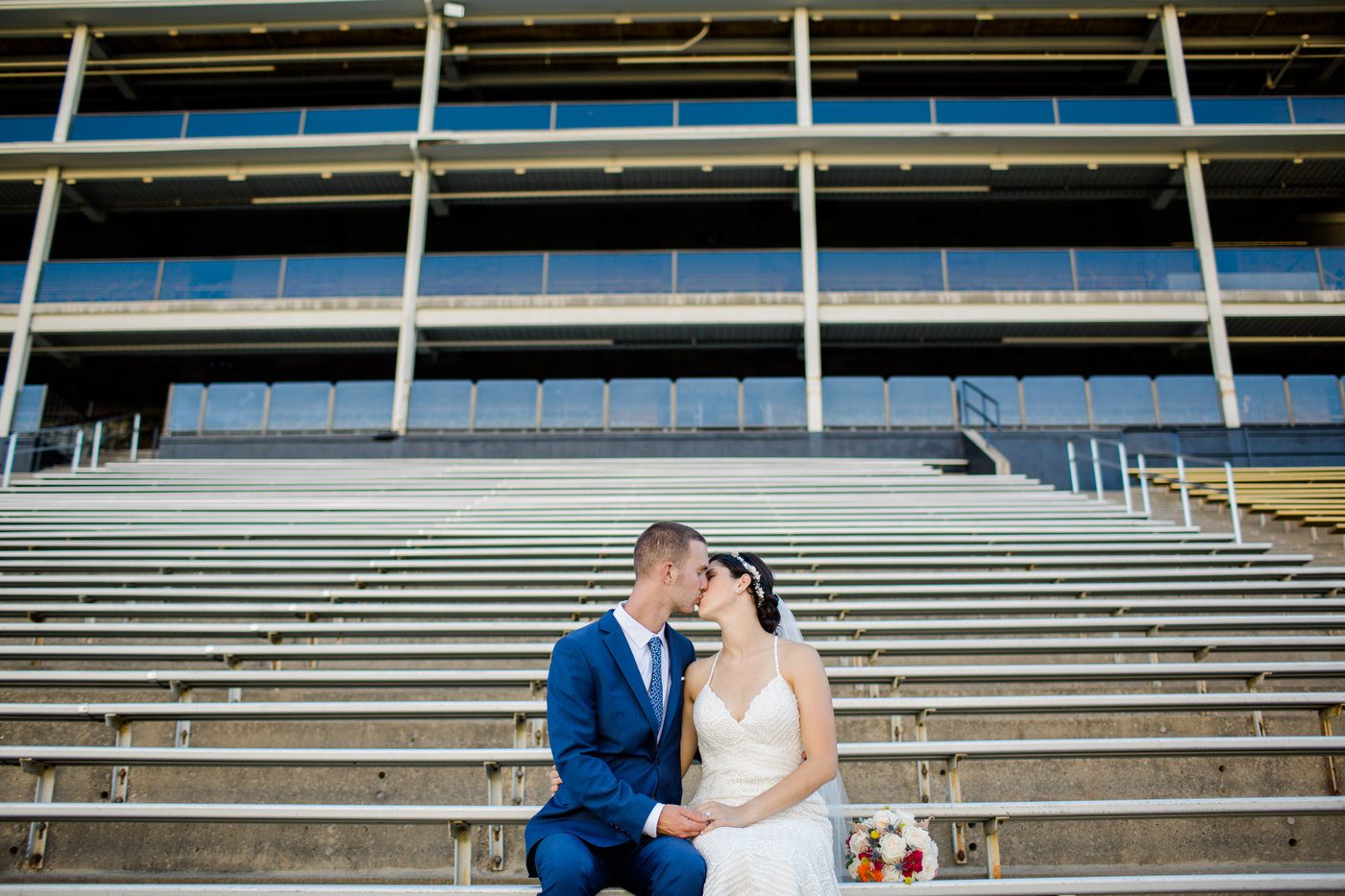 Football stadium wedding photo