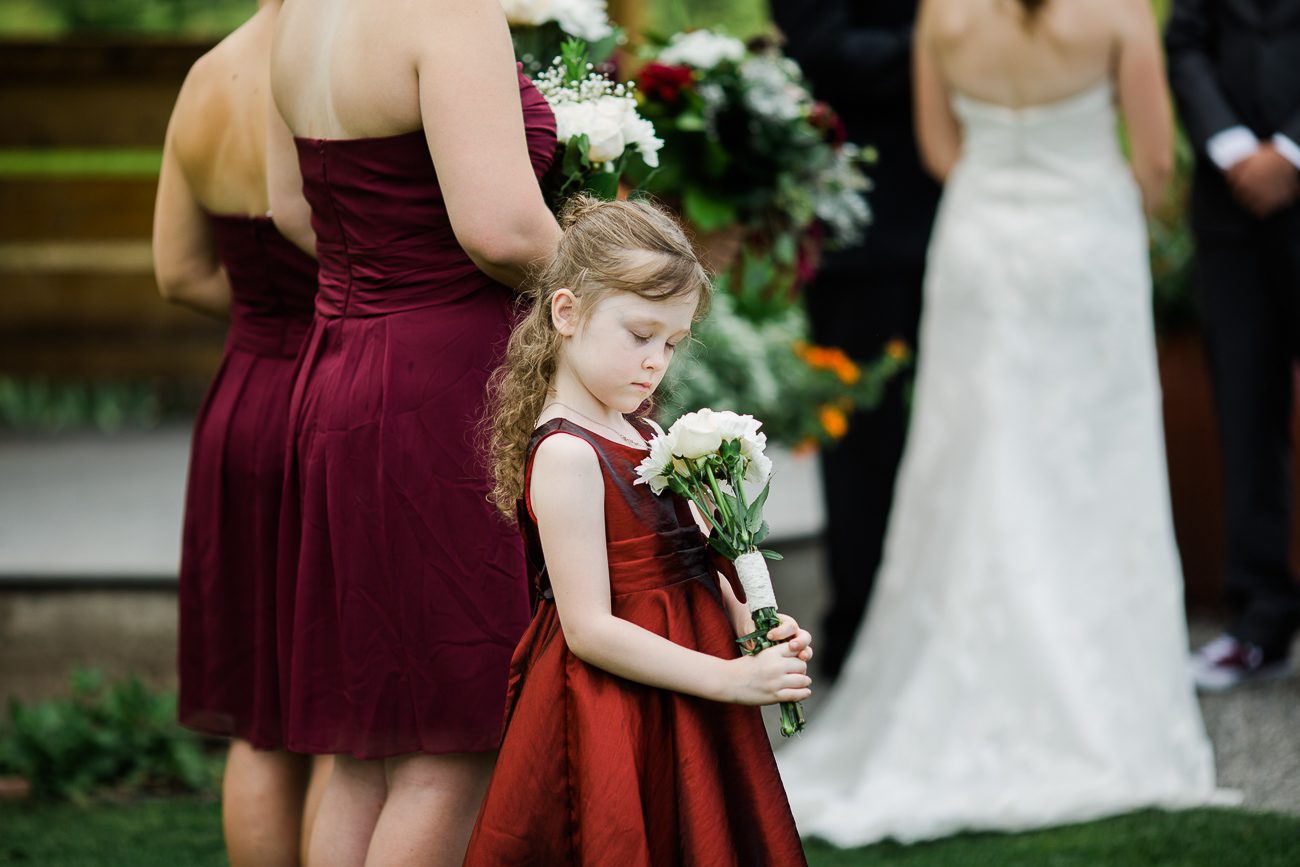 Flower girl during wedding ceremony