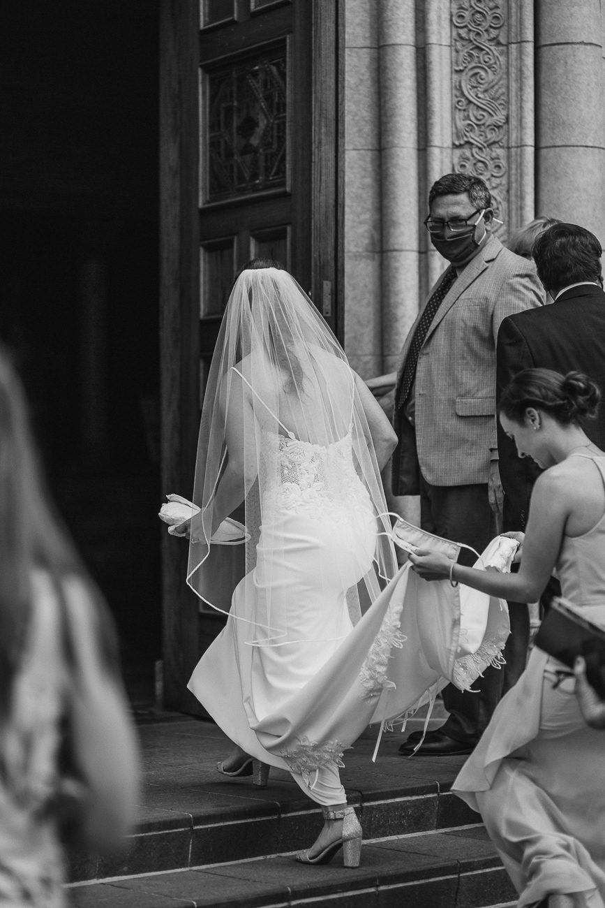Bride walking into church