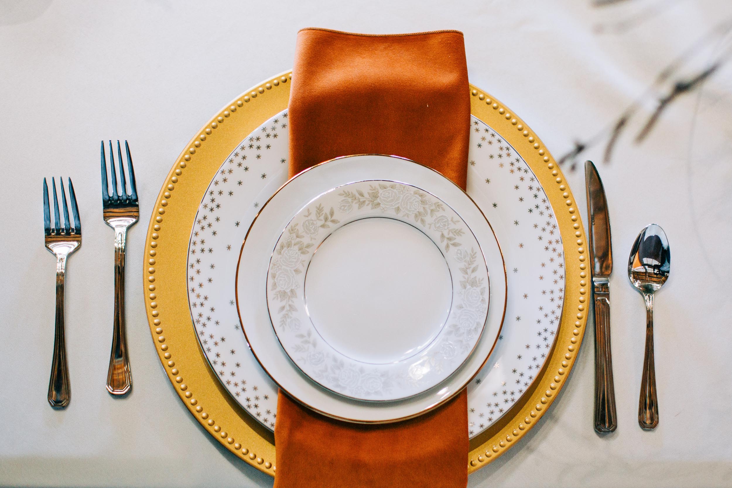Place setting ideas at wedding orange and yellow