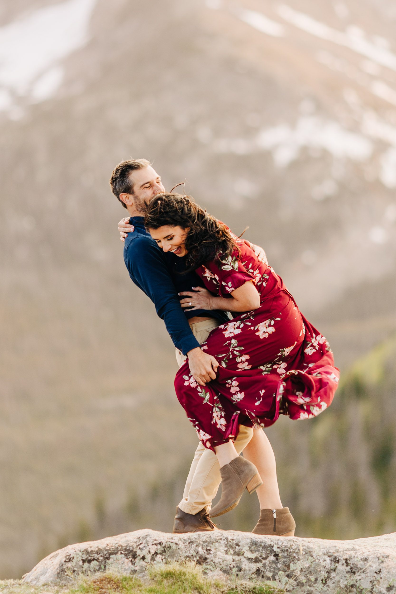 Couple laughing at engagement session