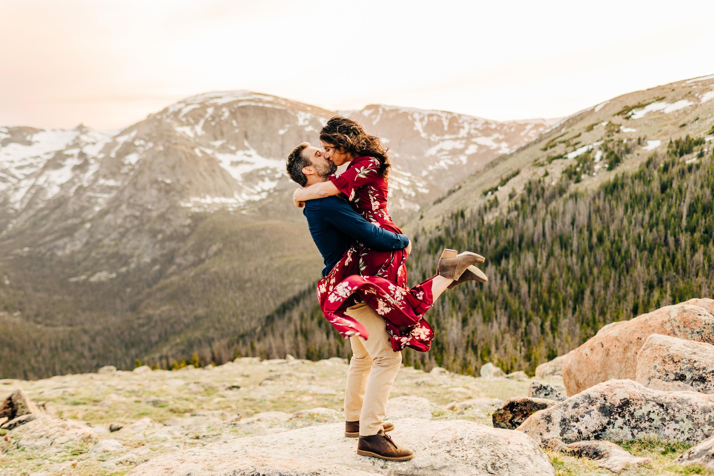 Colorado engagement photo of man lifting woman