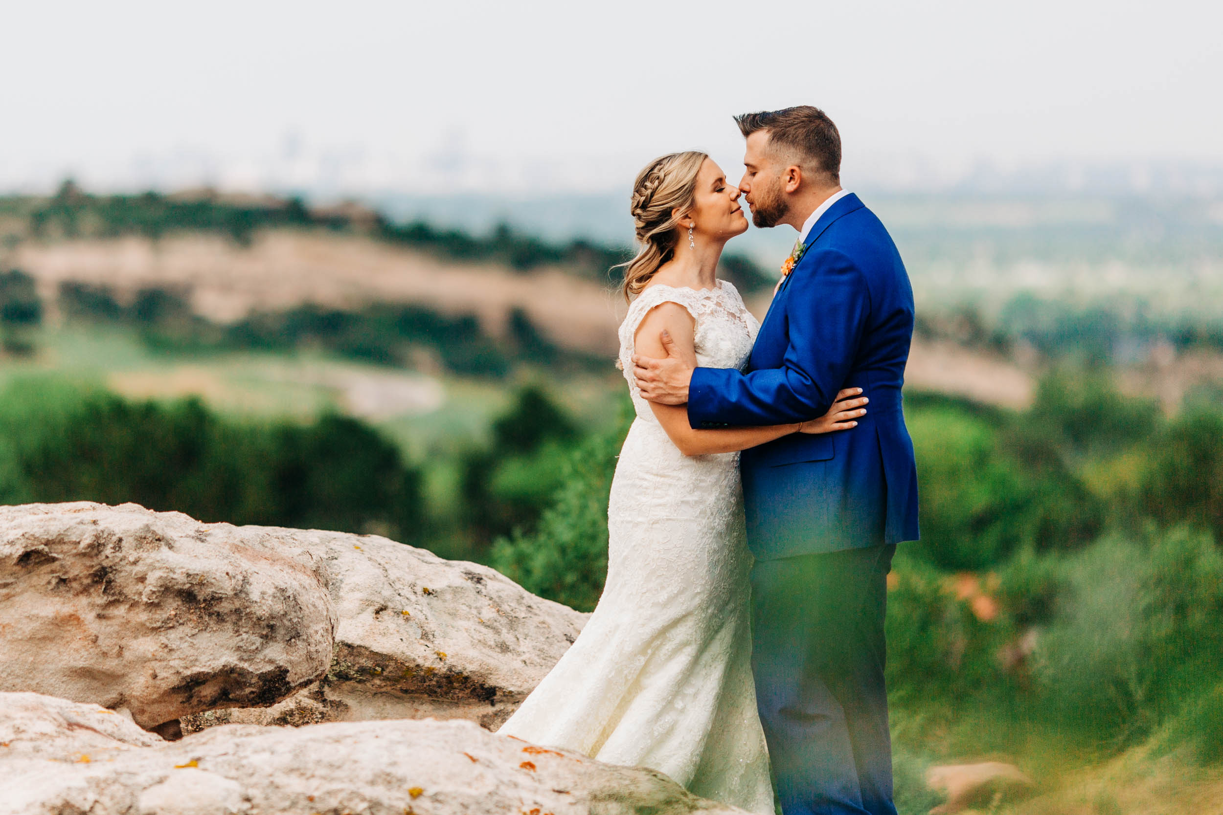 wedding couple kissing at red rocks country club by Shea McGrath Photography Denver Colorado Wedding Photographer