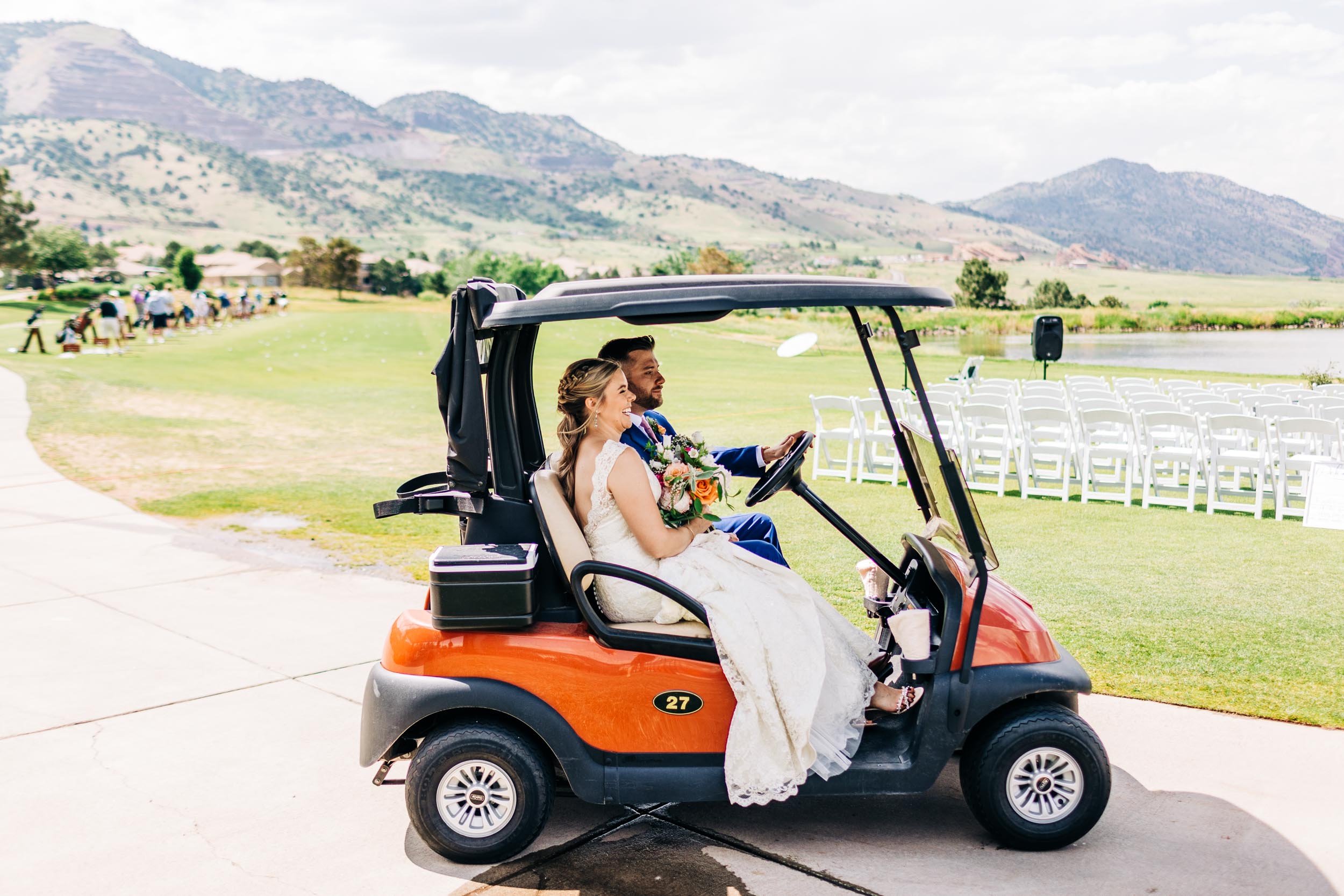 wedding couple driving golf cart by Shea McGrath Photography Denver Colorado Wedding Photographer