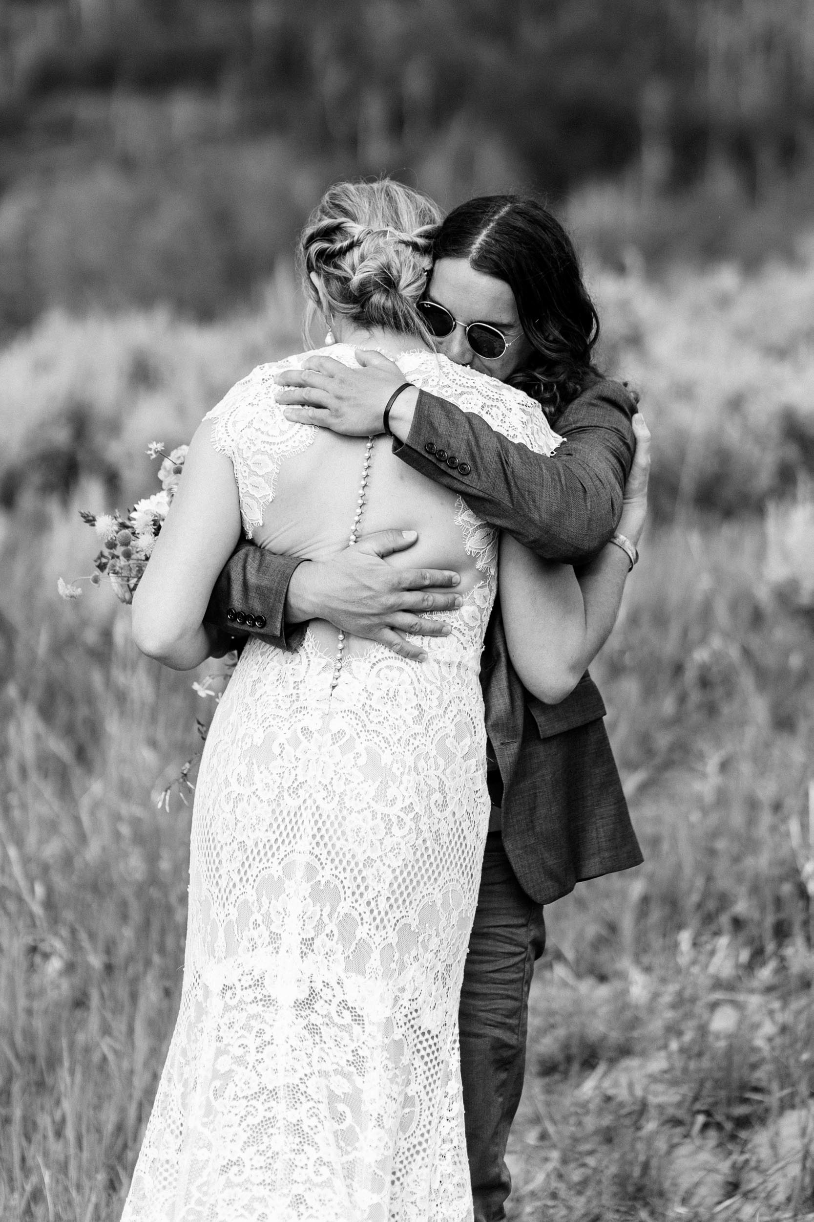 Bride and Groom hugging after first look