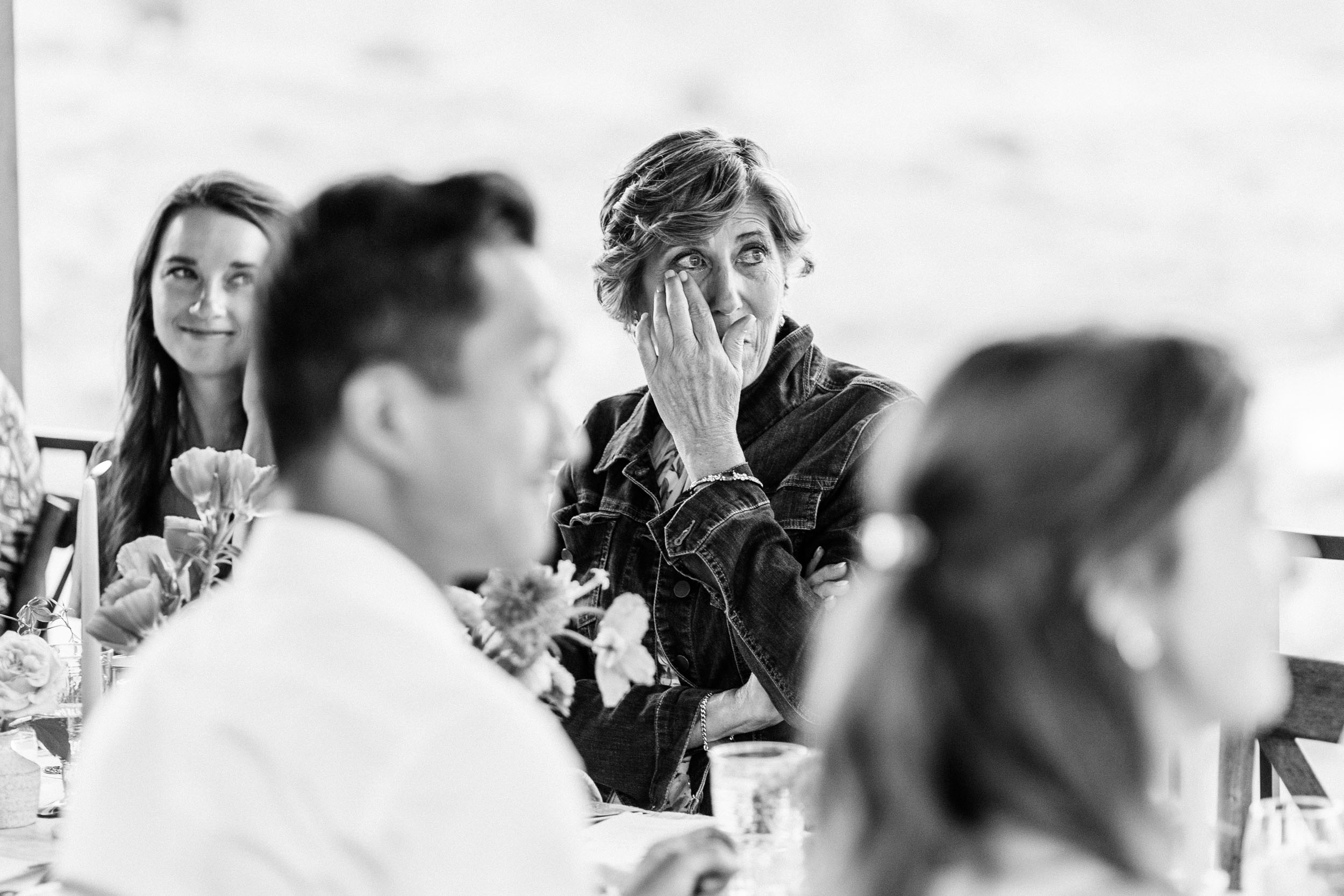 Mom crying during toasts at wedding