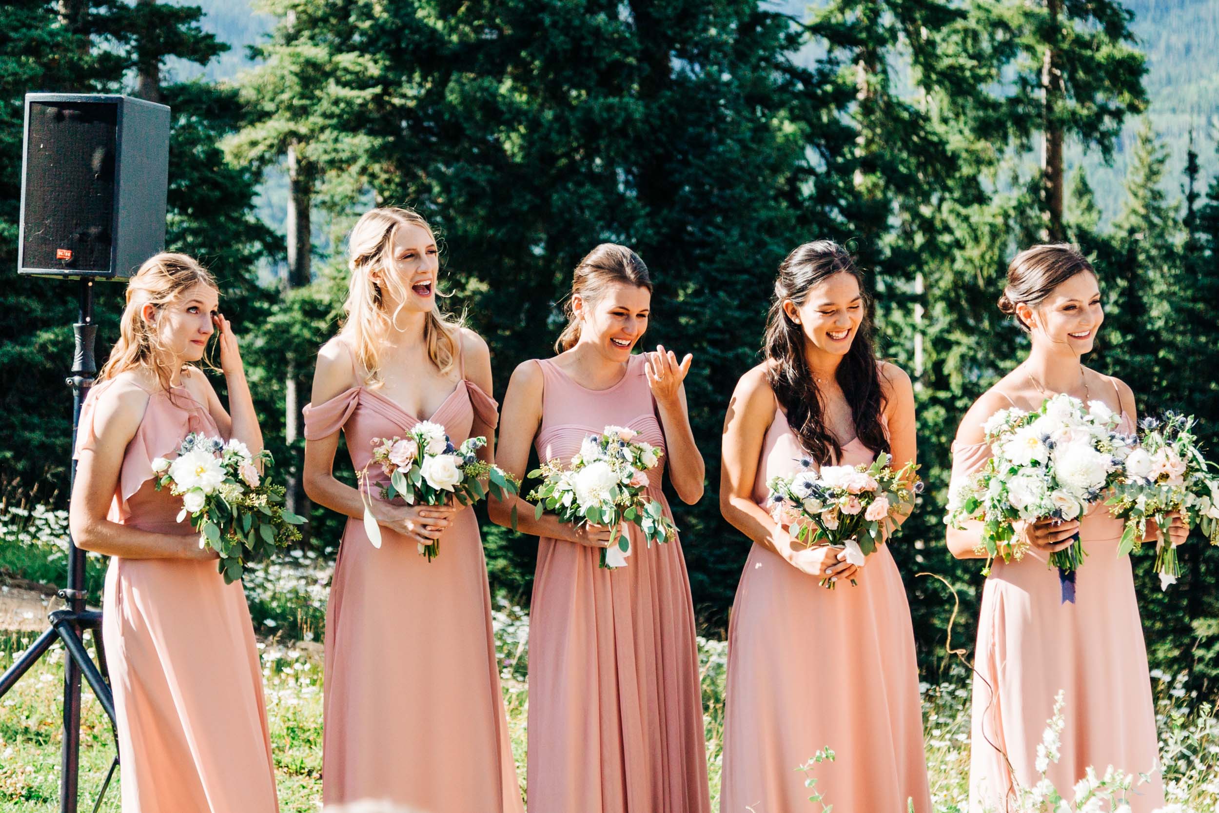 Bridesmaids crying at ceremony