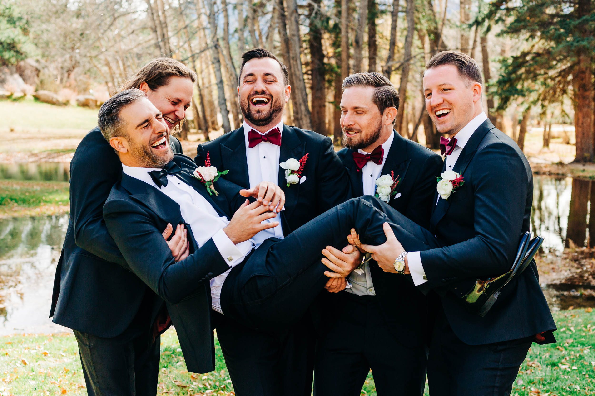 fun groomsmen photos at Black Canyon Inn in Estes Park