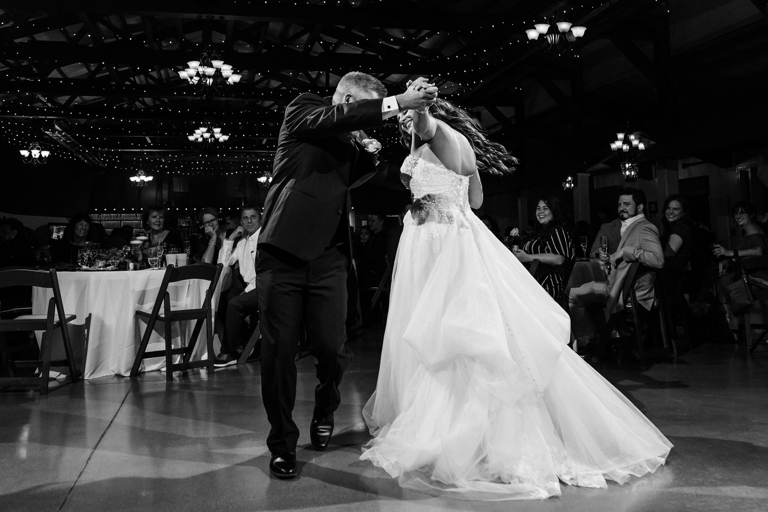 black and white image of bride and groom's first dance