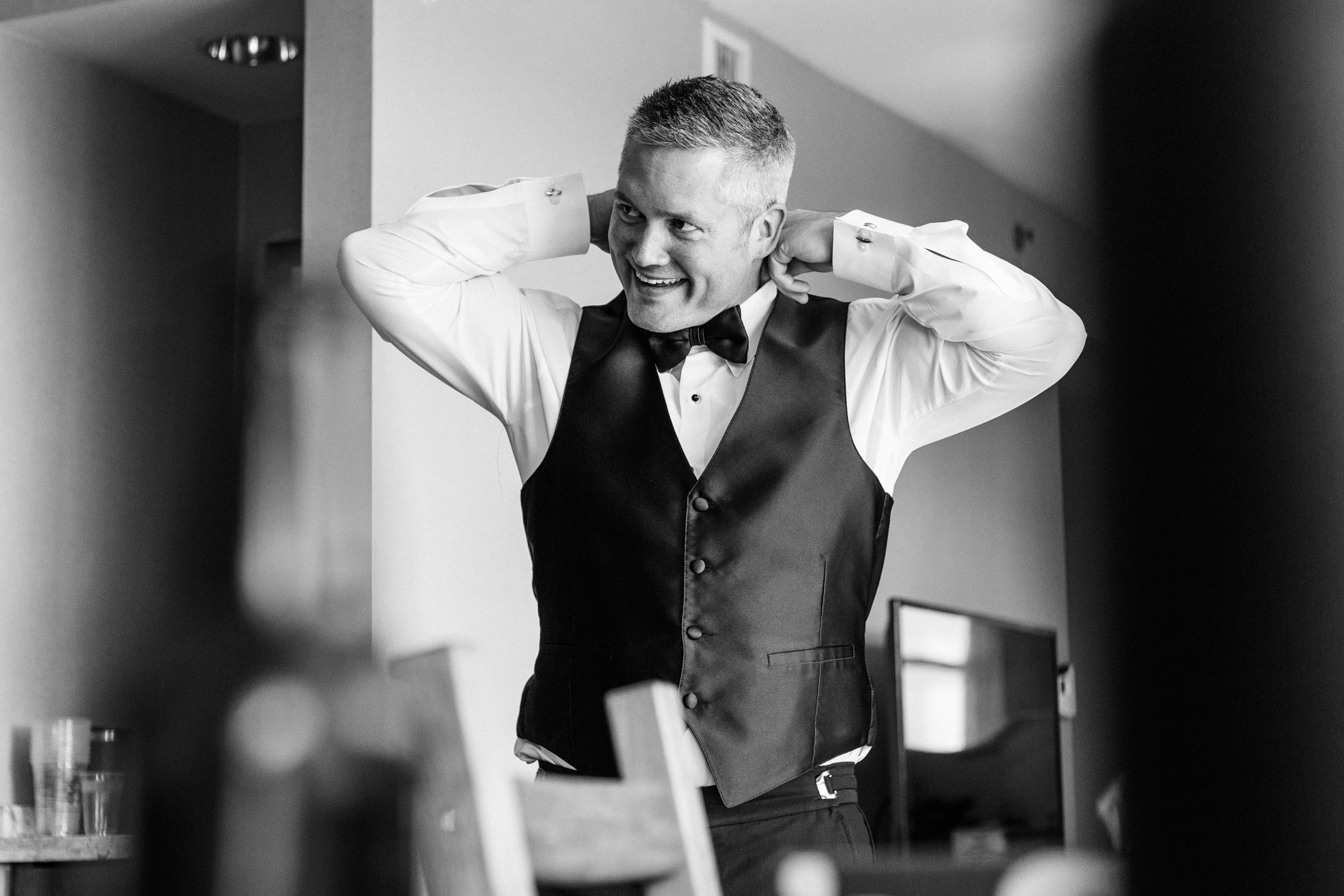 groom getting ready for wedding