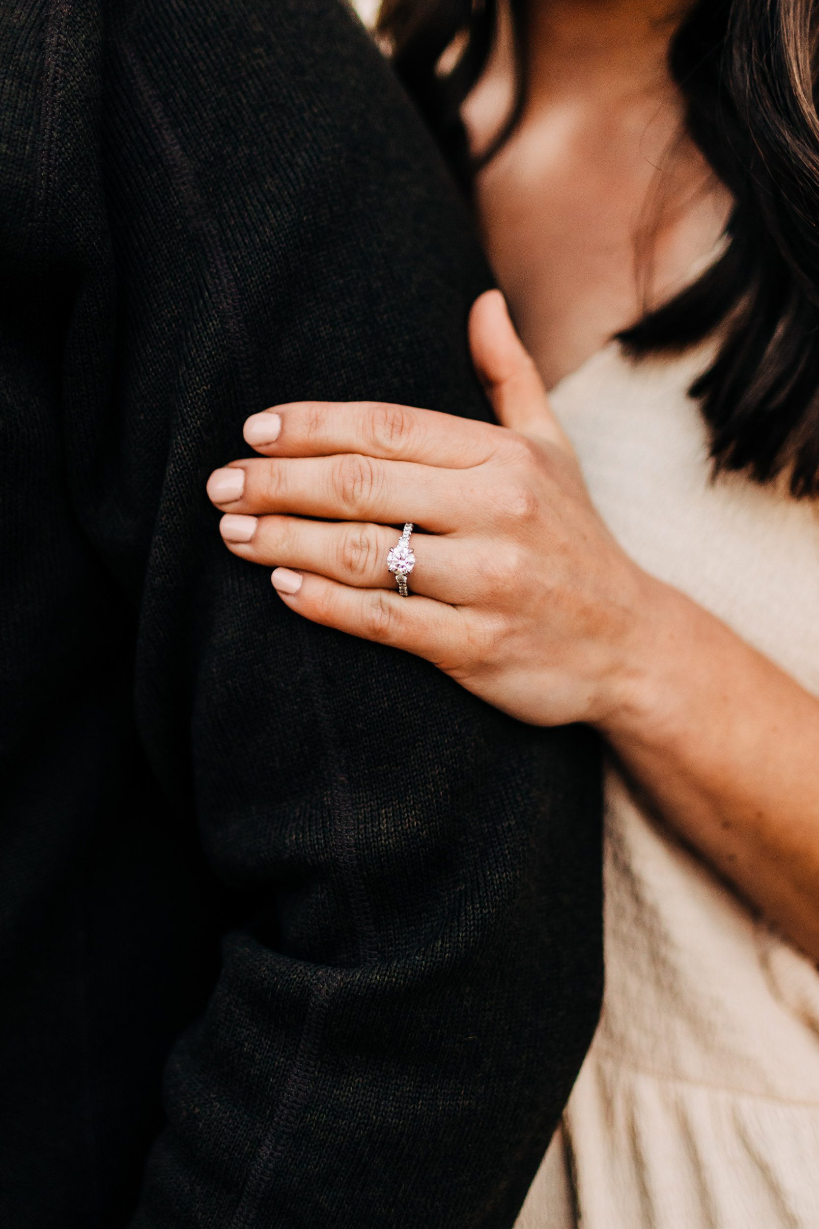 close up of engagement ring at engagement photography session