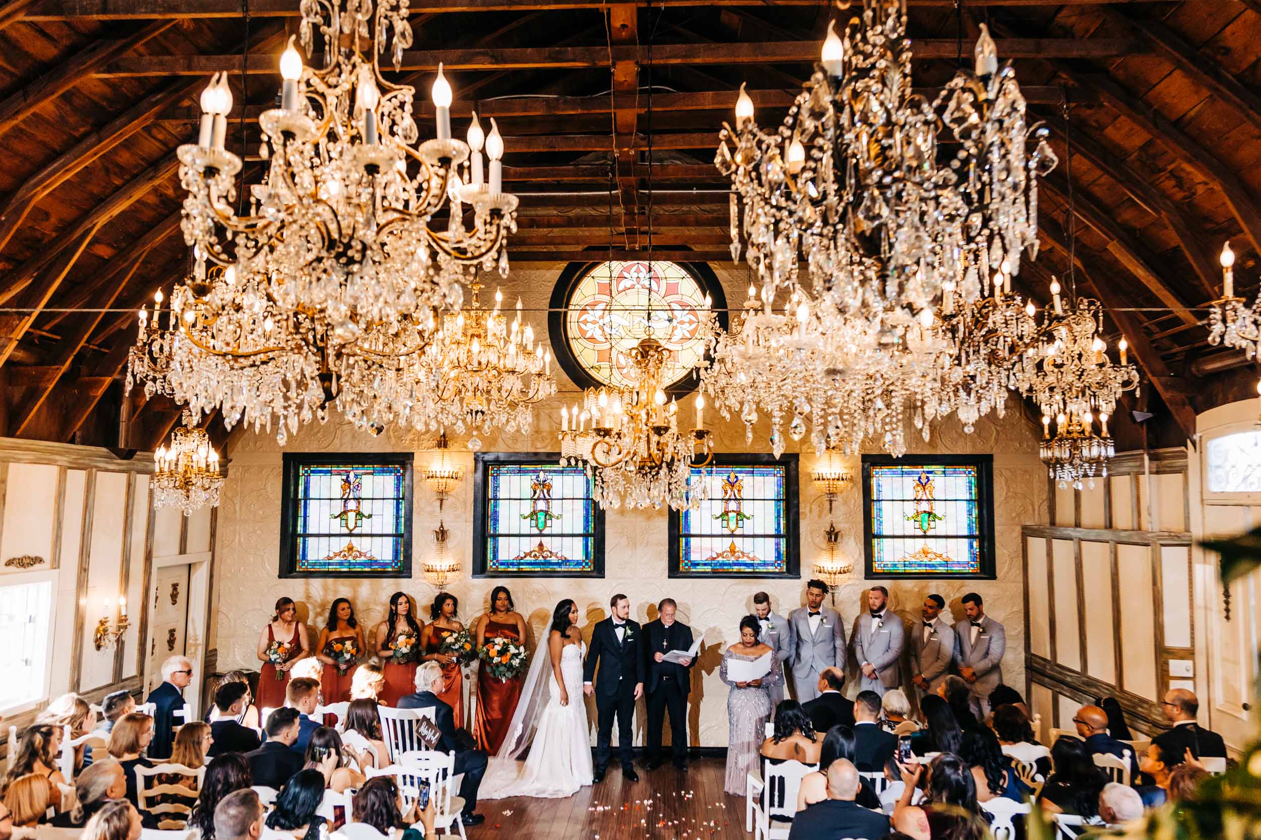 lionsgate event center chandelier barn wedding ceremony