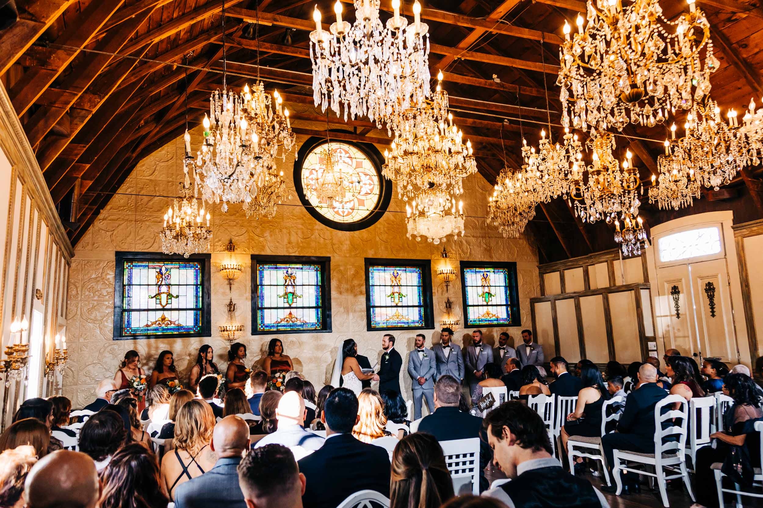 chandlier barn wedding ceremony at lionsgate event center in colorado