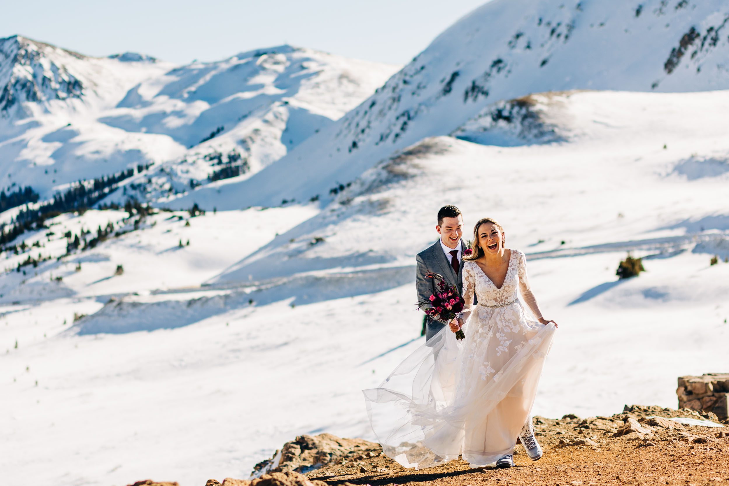 photo of couple walking at the top of loveland pass