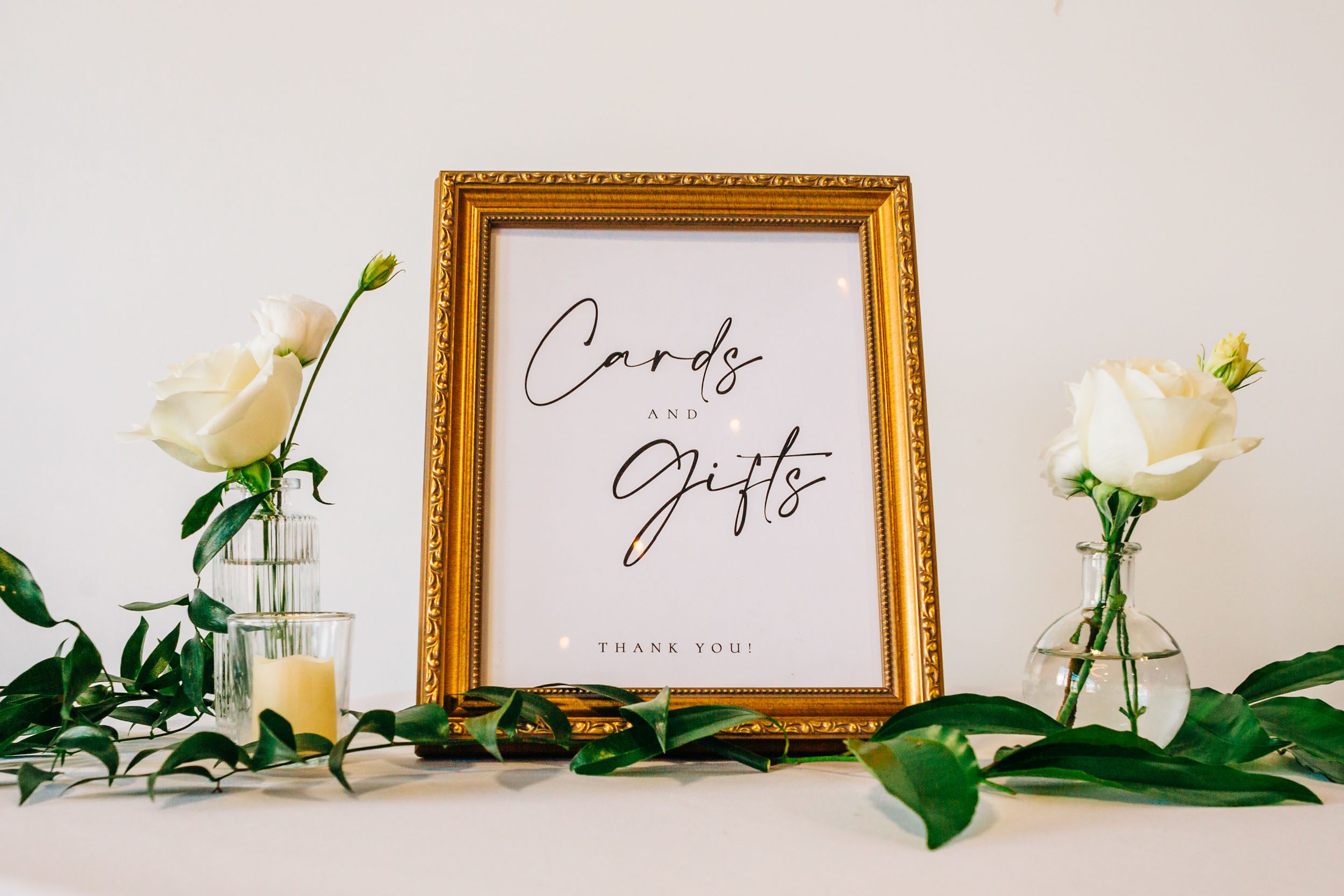 cards and gifts sign at wedding reception