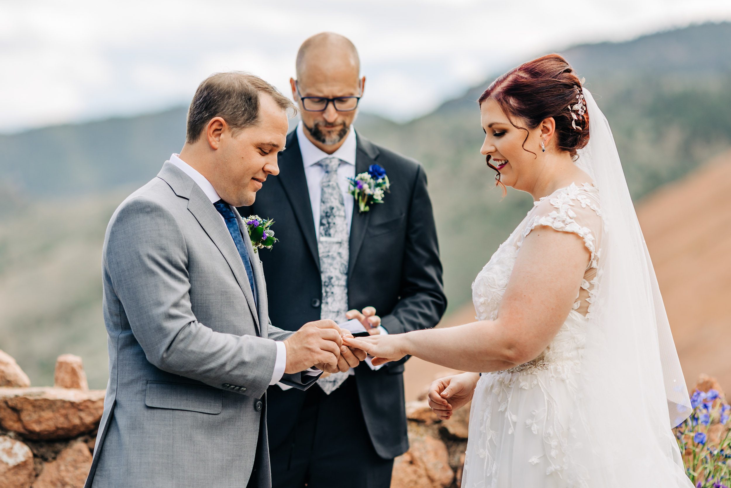 exchanging rings at red rocks trading post wedding ceremony