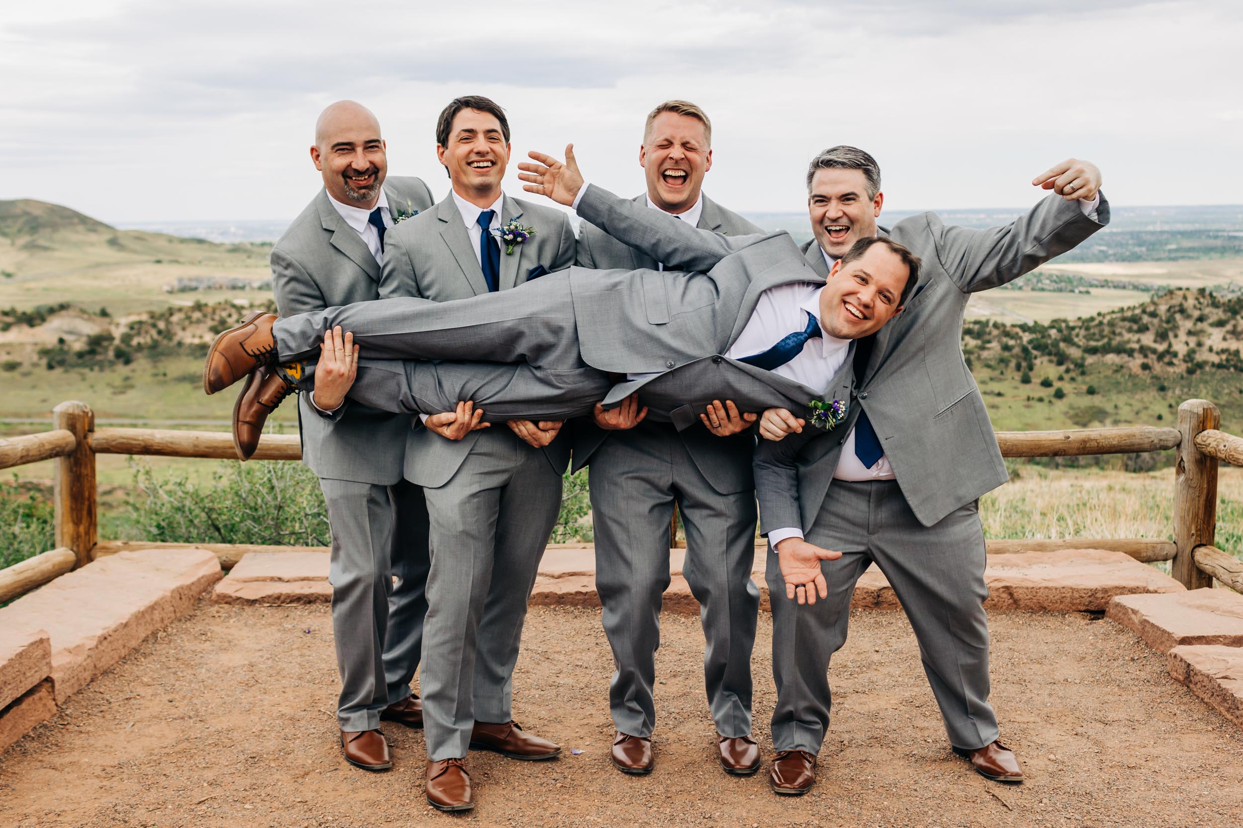 fun groomsmen photos at red rocks