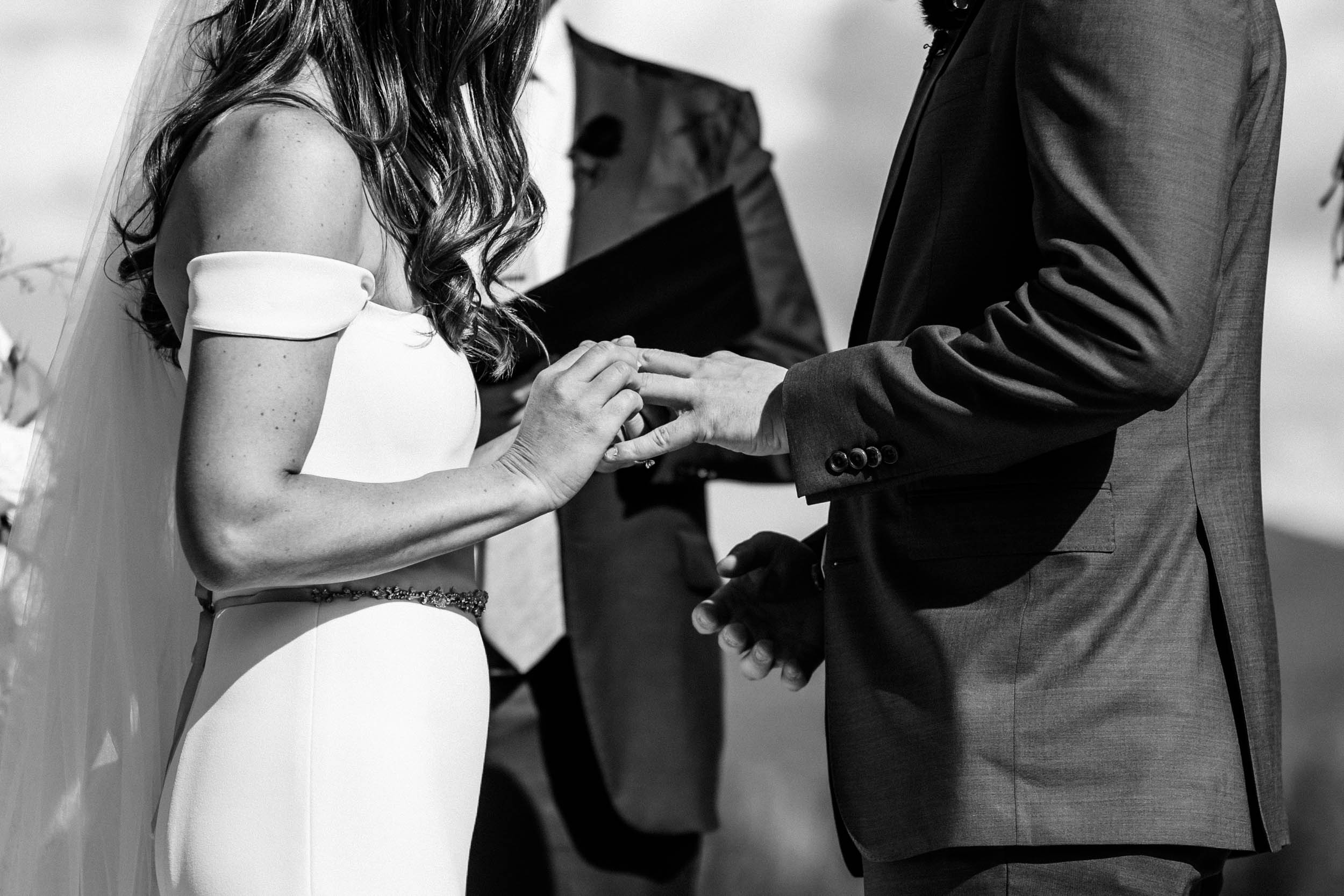 exchanging rings at Ten Mile station wedding