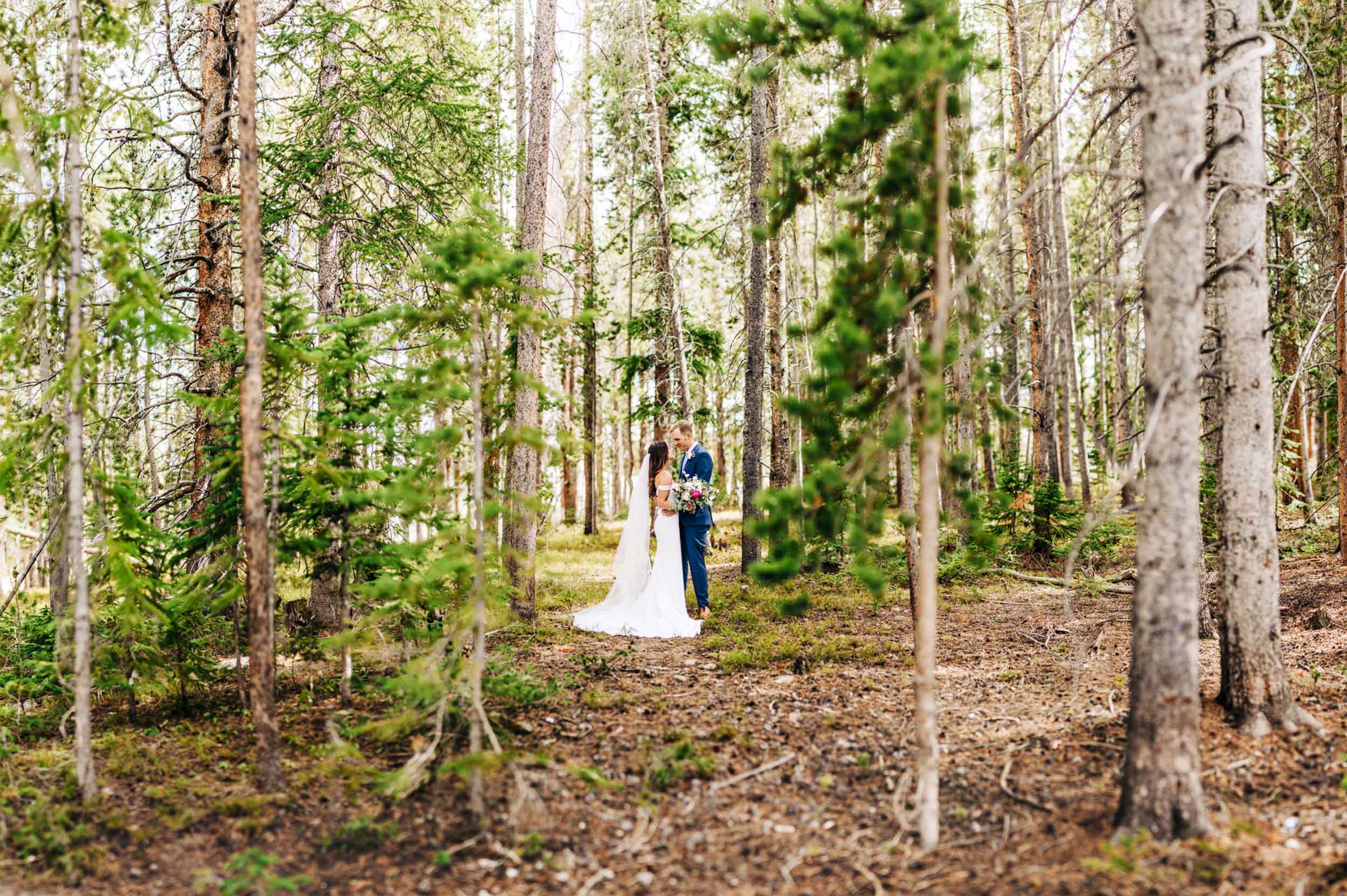 Brenizer wedding photo in the woods in Breckenridge