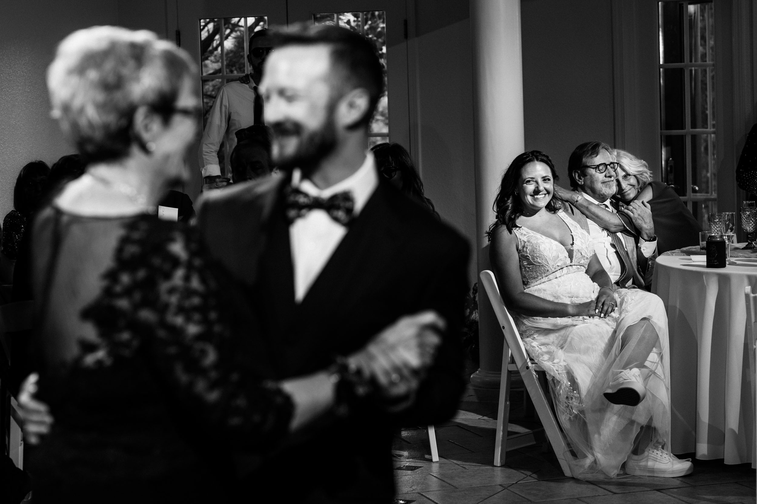 Bride and parents watching mother son dance at Lionscrest Manor