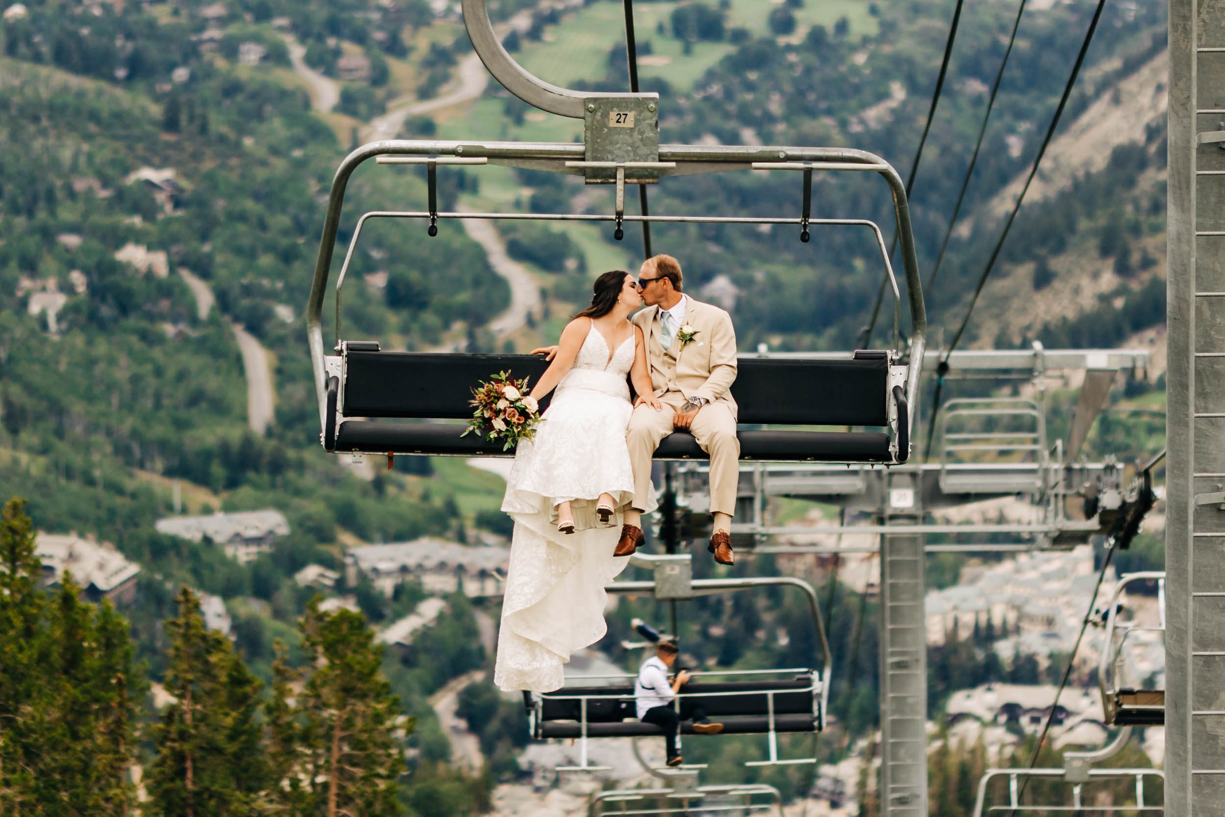 wedding photo on ski lift at beaver creek colorado