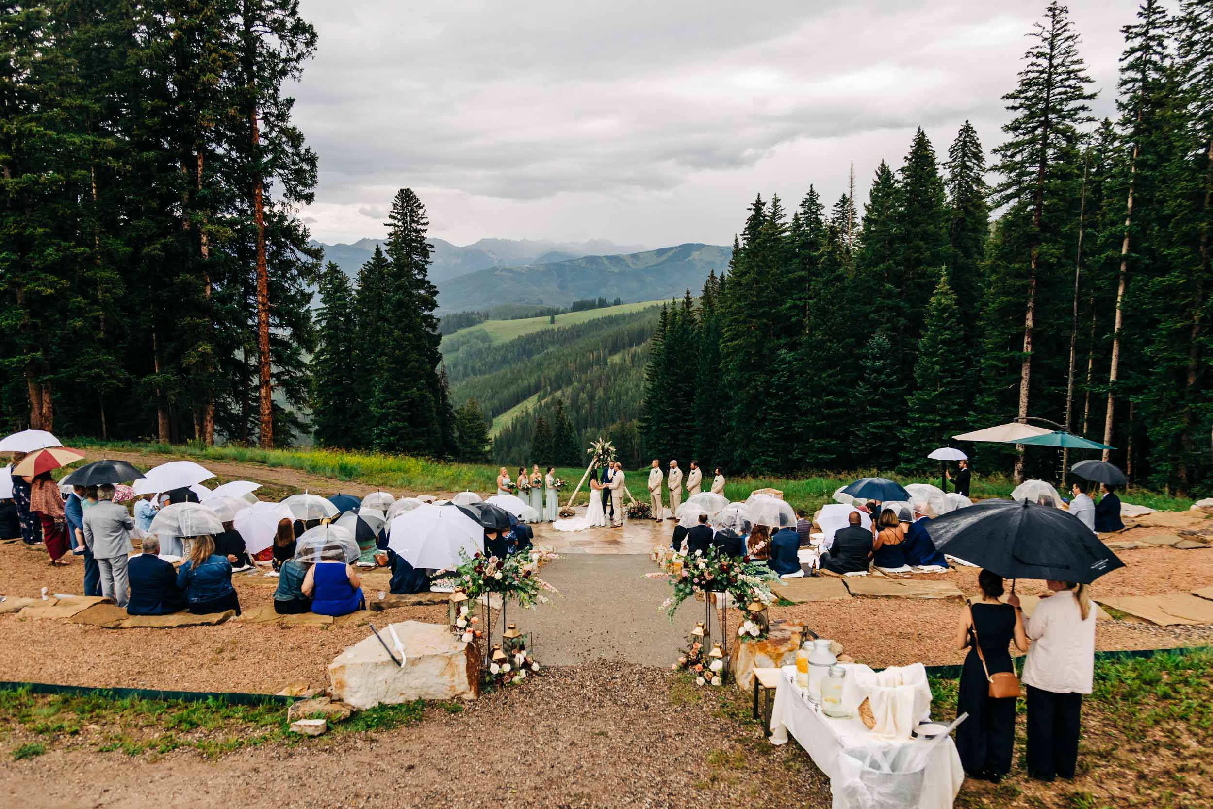 beaver creek wedding deck ceremony in the rain