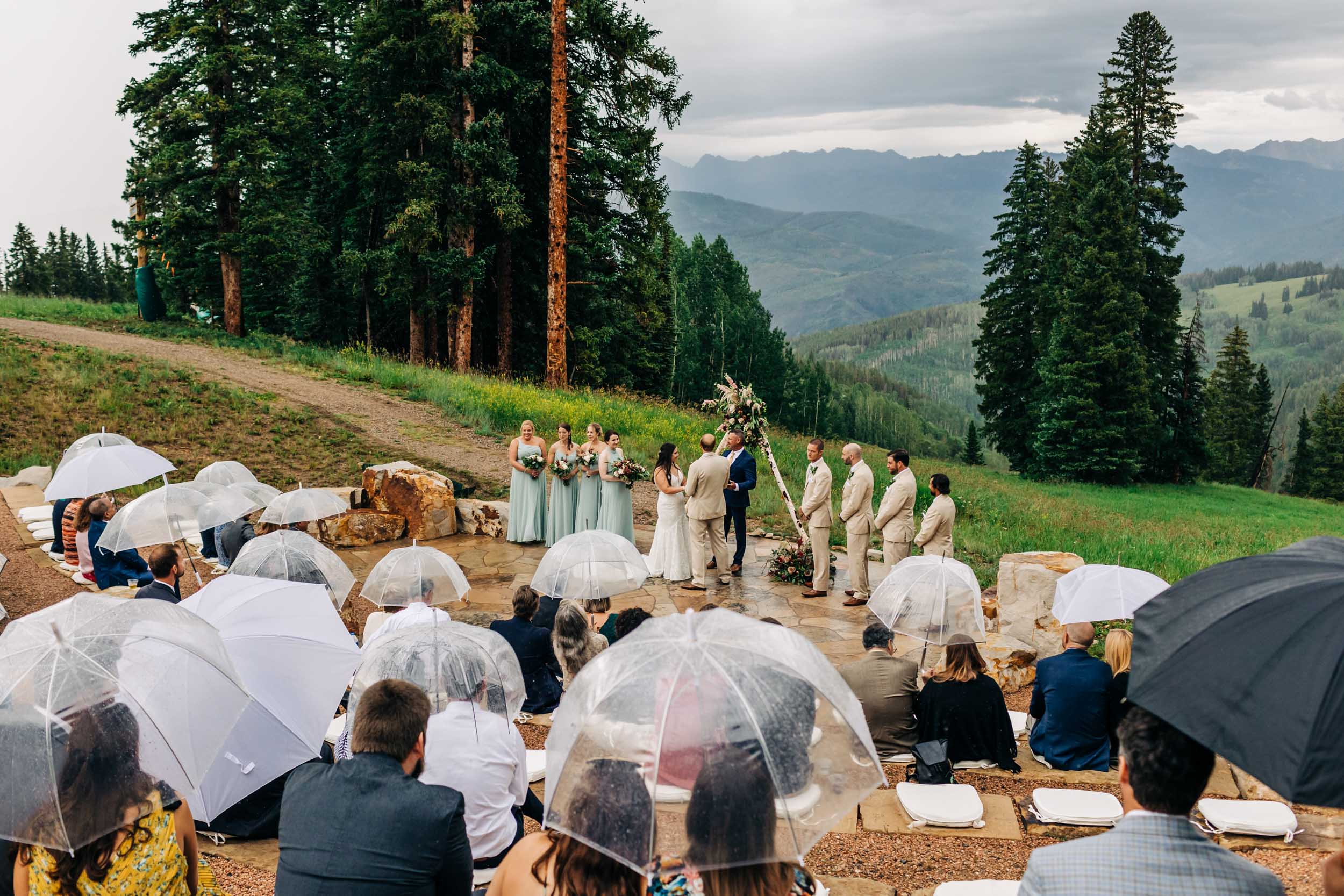 beaver creek wedding deck ceremony in the rain